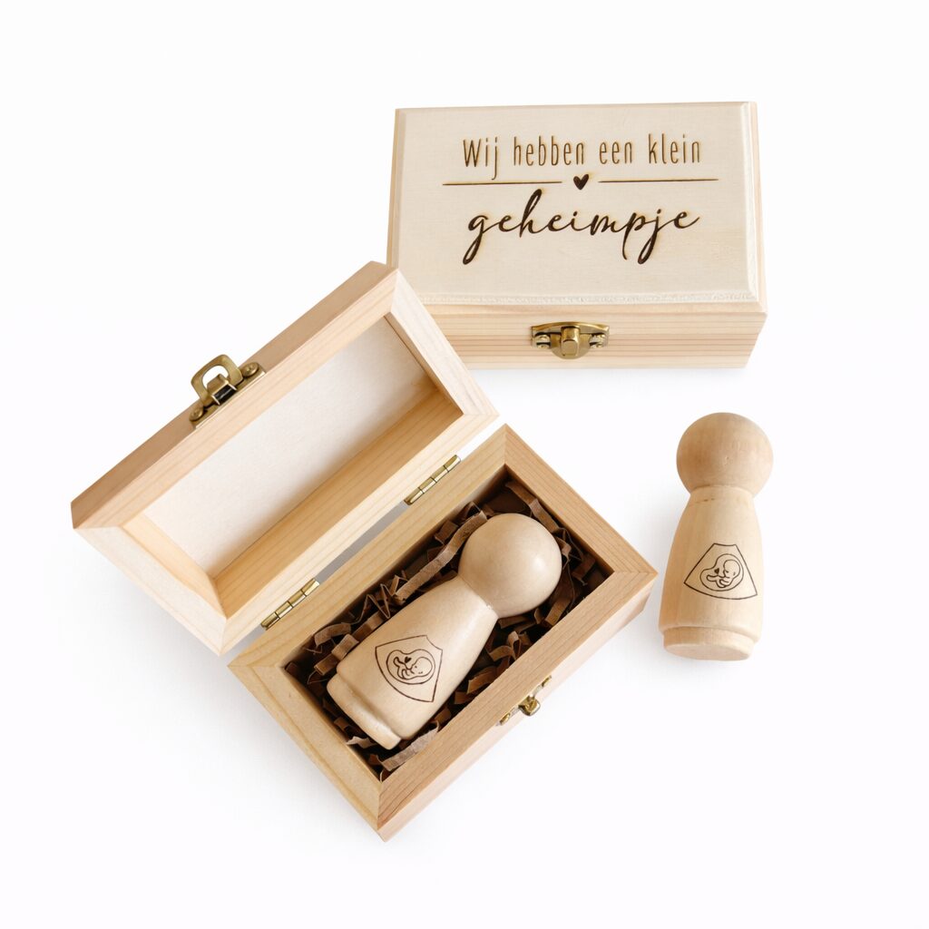 Aankondigingskistje met poppetje