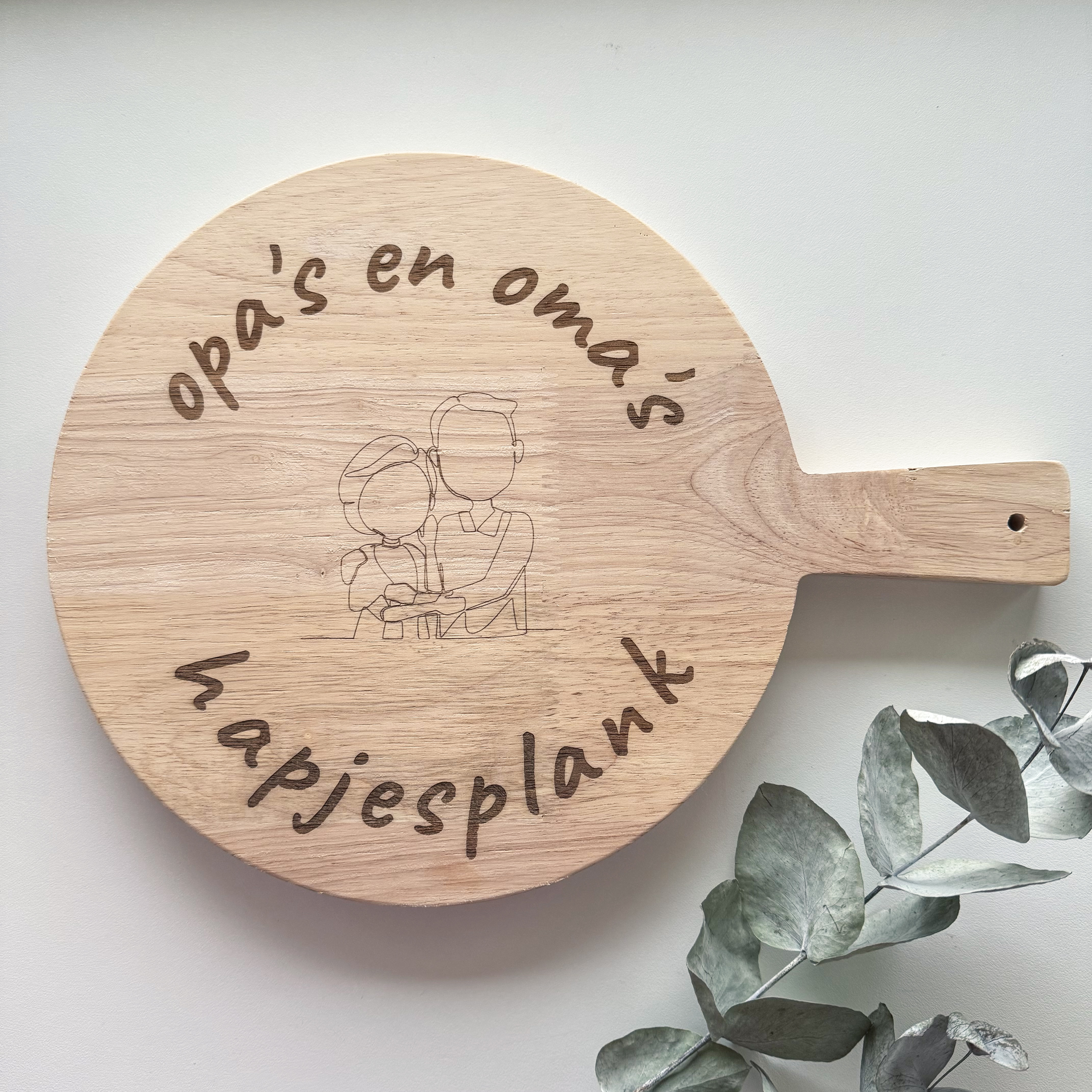 Houten borrelplank voor opa en oma gegraveerd
